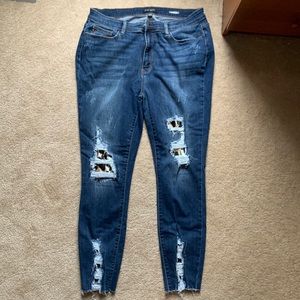 Judy Blue distressed leopard patch, raw hem jeans.